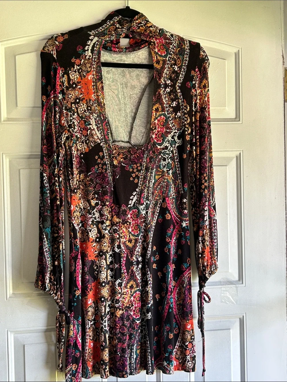 FREE PEOPLE “ALL DOLLED UP “ MINI DRESS WITH A TURTLENECK AND KEYHOLE BACK SZ S